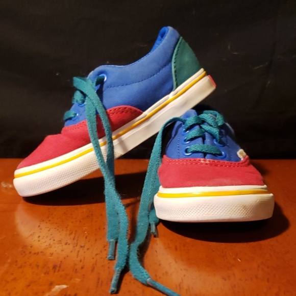 red yellow blue and green vans